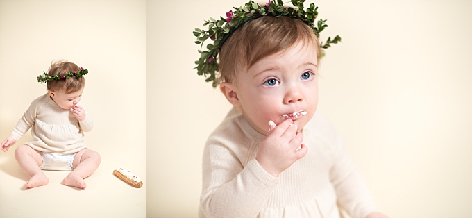 baby photographers columbus ohio baby tasting frosting in neutral backdrop