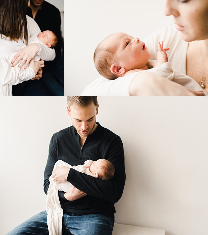 newborn photography columbus ohio baby girl awake snuggles in mom and dads arms