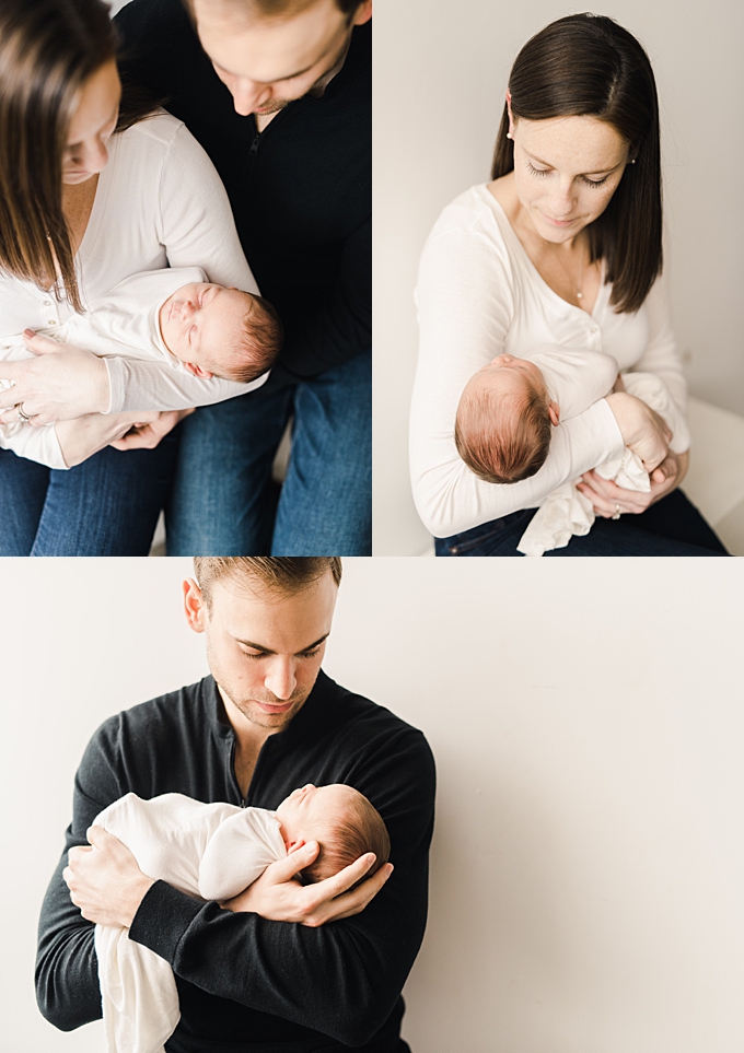 newborn photography columbus ohio newborn girl sleeps in mom and dads arms