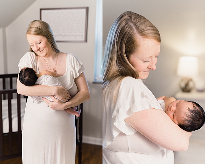 columbus newborn photographer mom dressed in white gown looks down lovingly at daughter