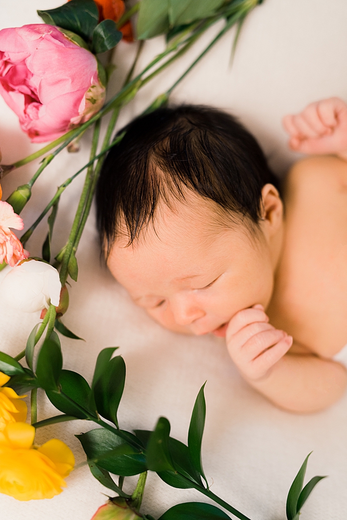 columbus newborn photographer details of baby girl and flowers