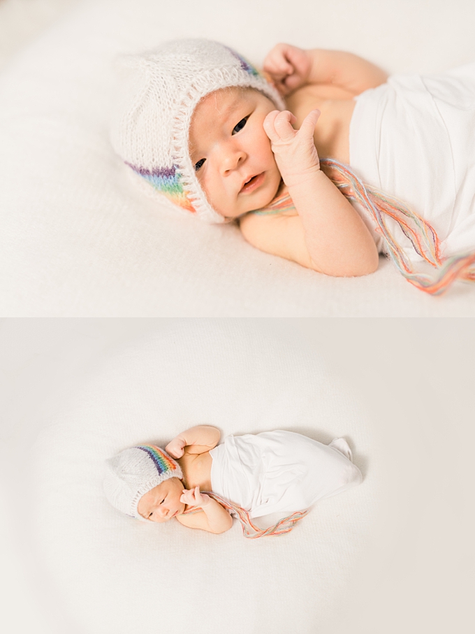 columbus newborn photographer rainbow baby wears a rainbow bonnet
