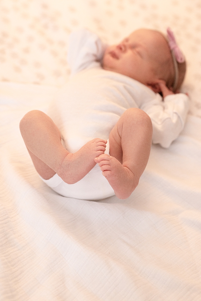 columbus lifestyle photographer newborn sleeps in crib