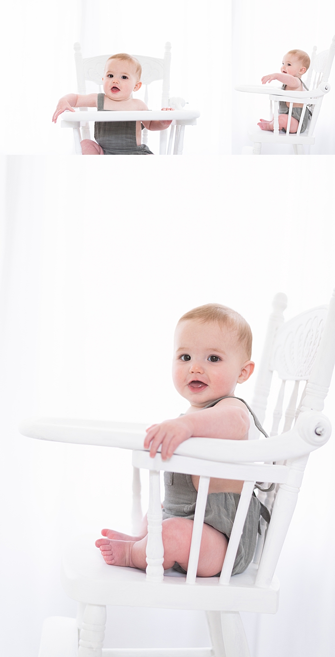 baby photography columbus baby boy dressed in sage green sits in white highchair