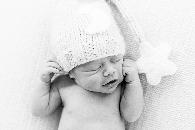 columbus ohio newborn photography black and white image of boy in hat