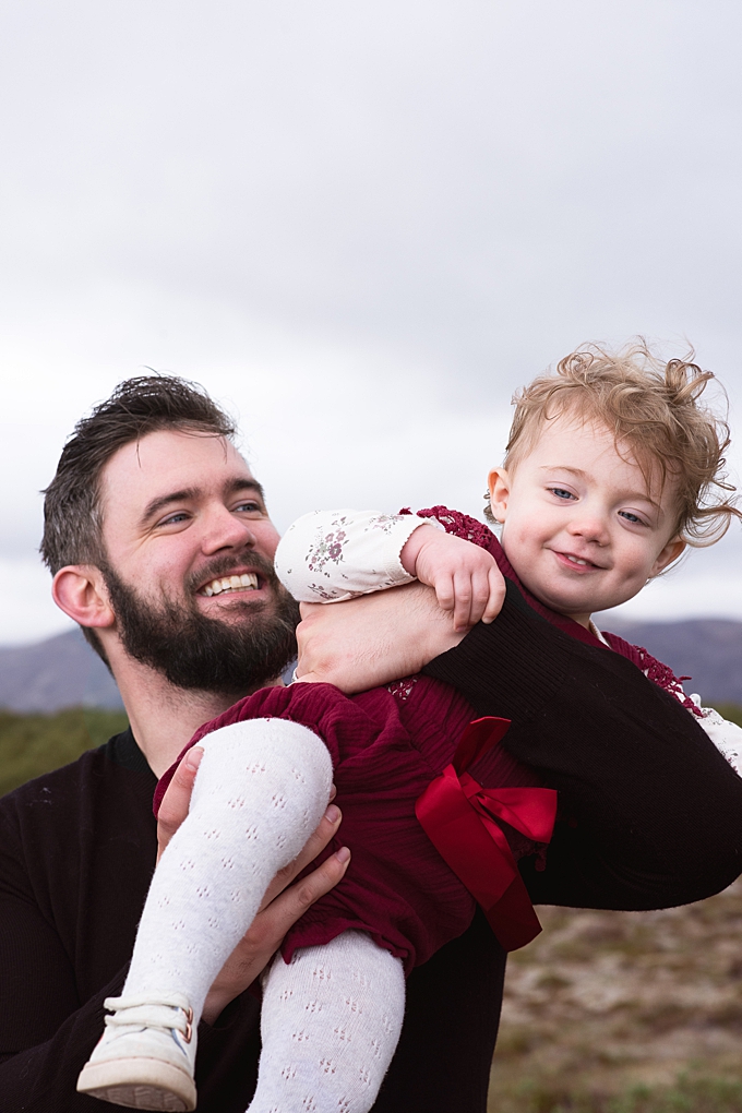 columbus family photographer traveling in iceland father and daughter play
