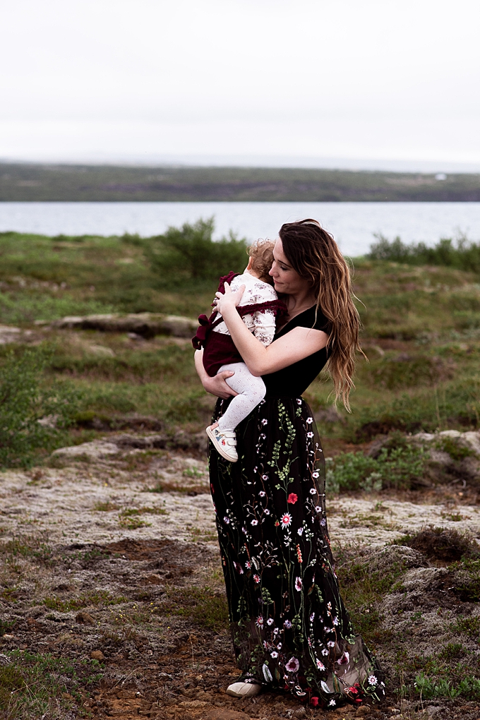 columbus family photographer family vacation mom comforts daughter in iceland