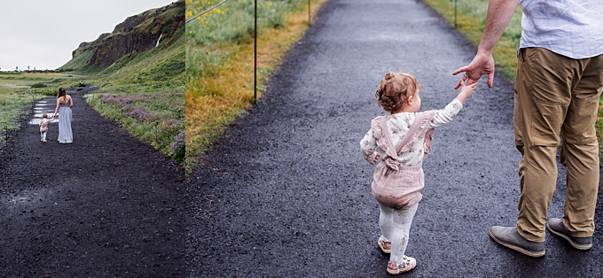 toddler girl dressed in Jamie Kay walks with her parents on gravel path