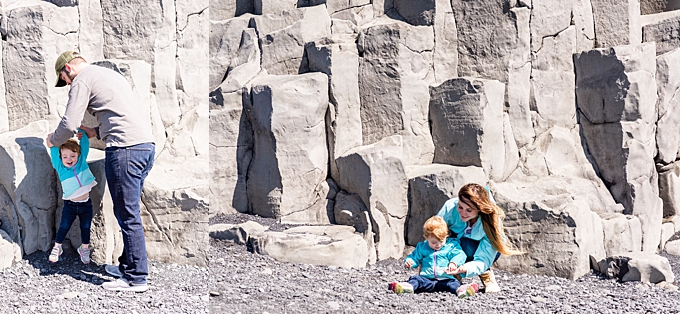 Reynisfjara beach lifestyle family photography family sitting on basalt