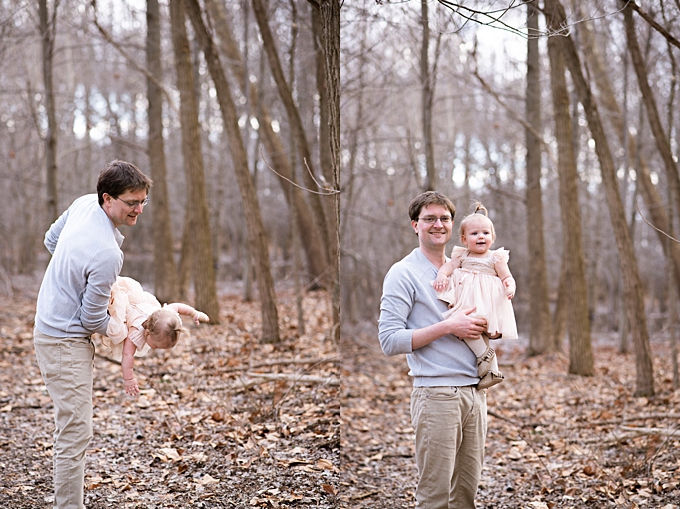 columbus family photographer dad plays with toddler outside in forest