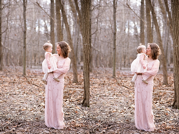 columbus family photographer mom holds and kisses baby girl 