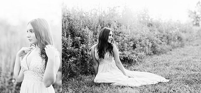 columbus senior portraits senior girl sits in field in gown