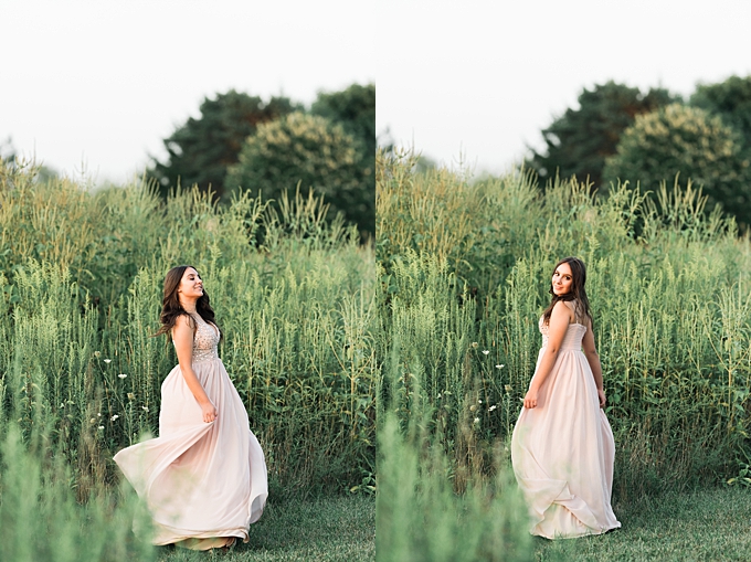 senior portraits columbus ohio girl twirls in field at sunset in blush dress