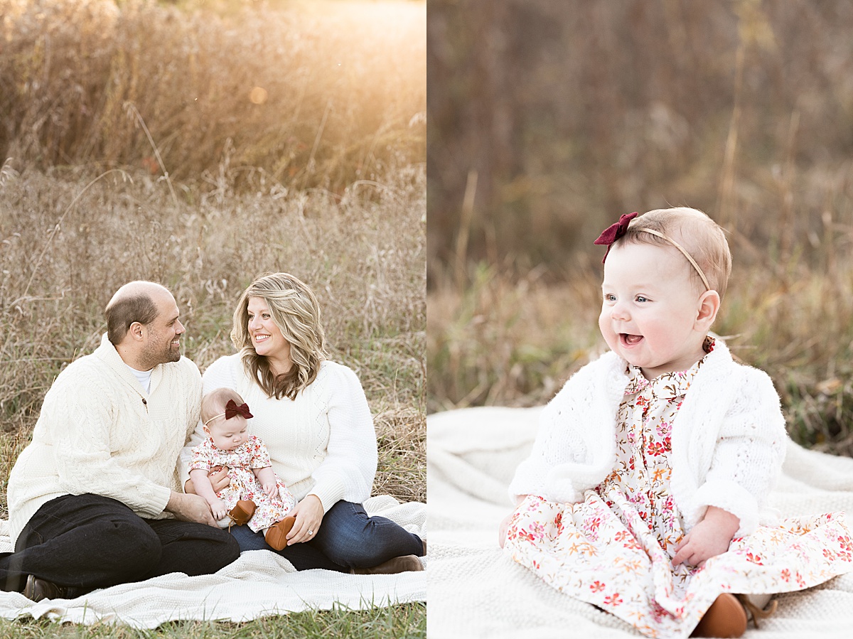 columbus lifestyle family photographer baby girl laughts with mom and dad holding her
