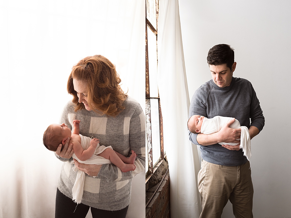 photography newborn mom and dad cradle newborn boy