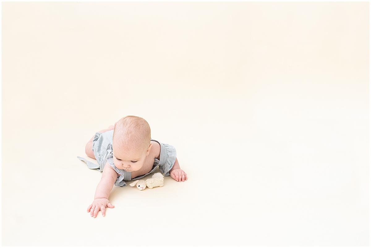 baby milestone photography in columbus ohio baby girl studies her hand