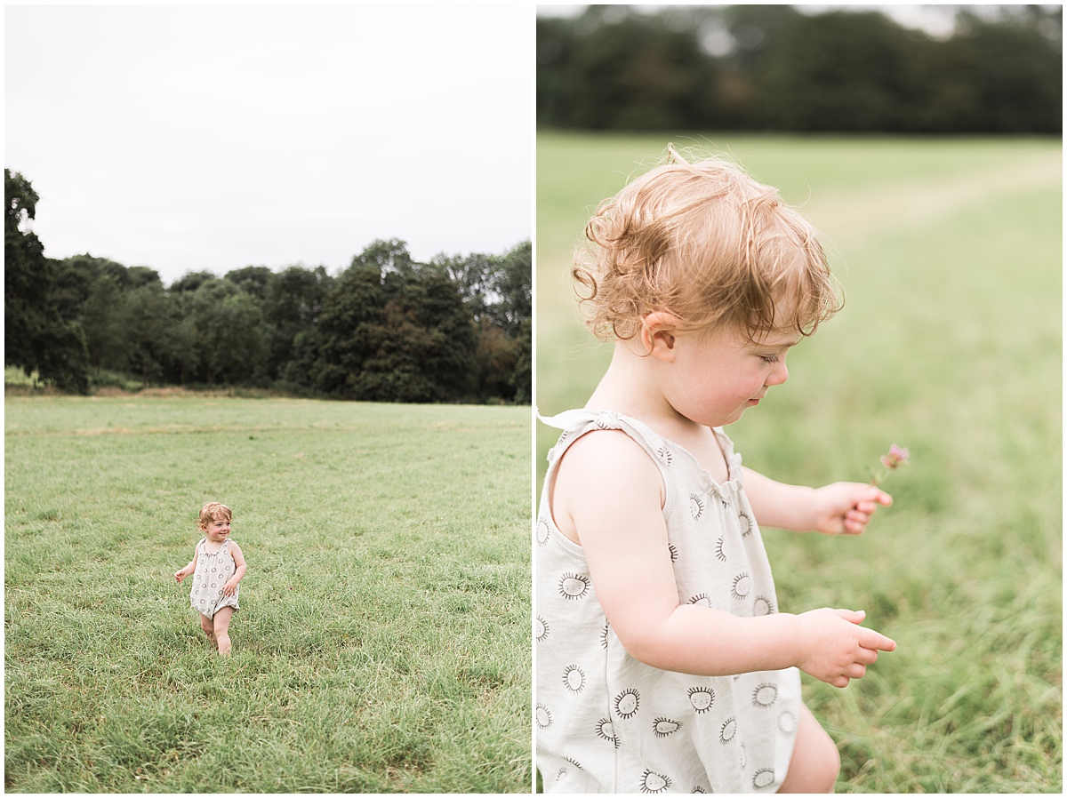 european travel photographer little girl runs through grasses of runnymeade