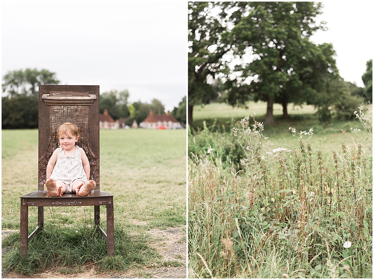 europe travel photographer toddler girl sits on chairs at runnymeade