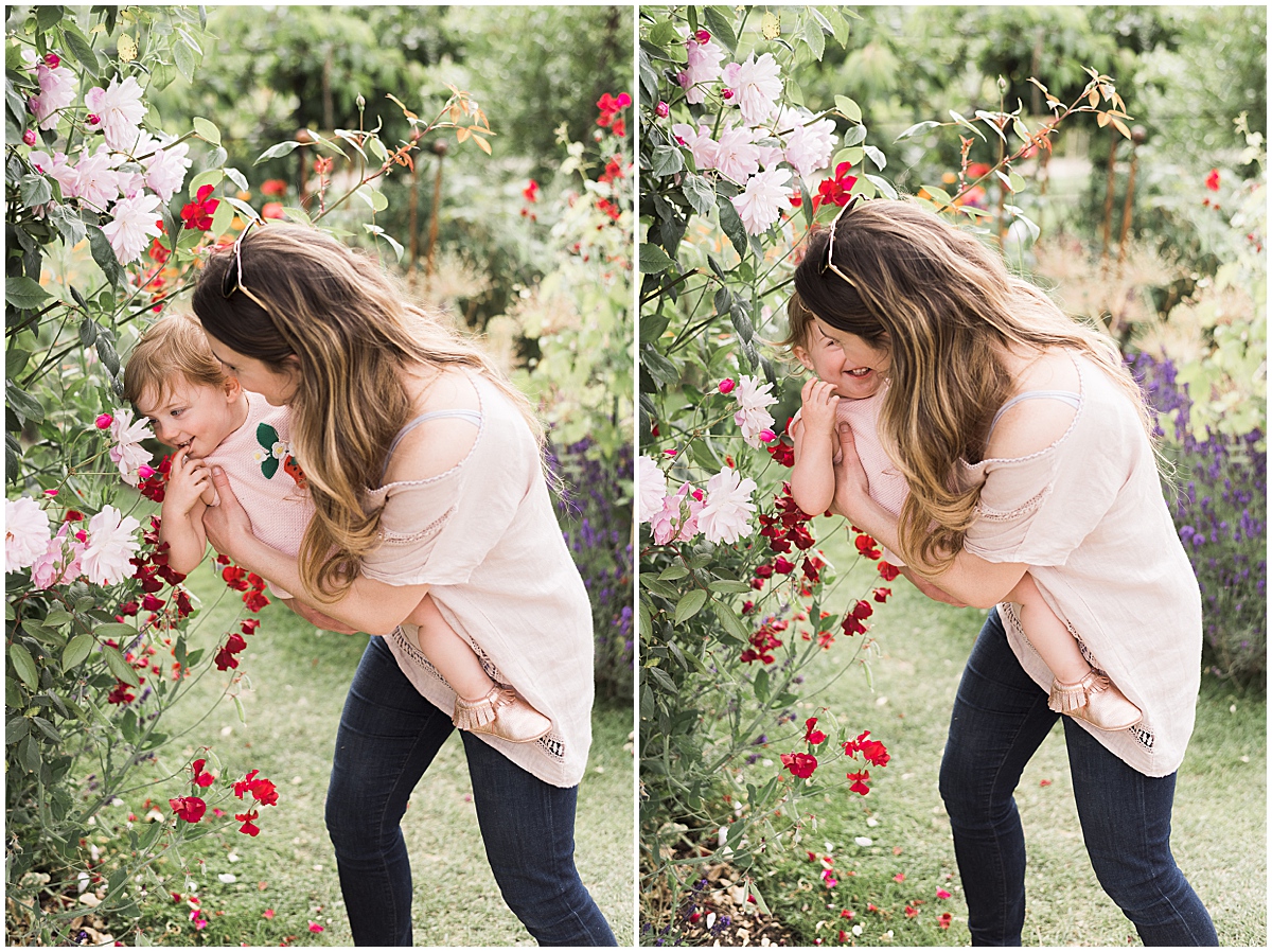 the photographer playing with her daughter in rose bushes