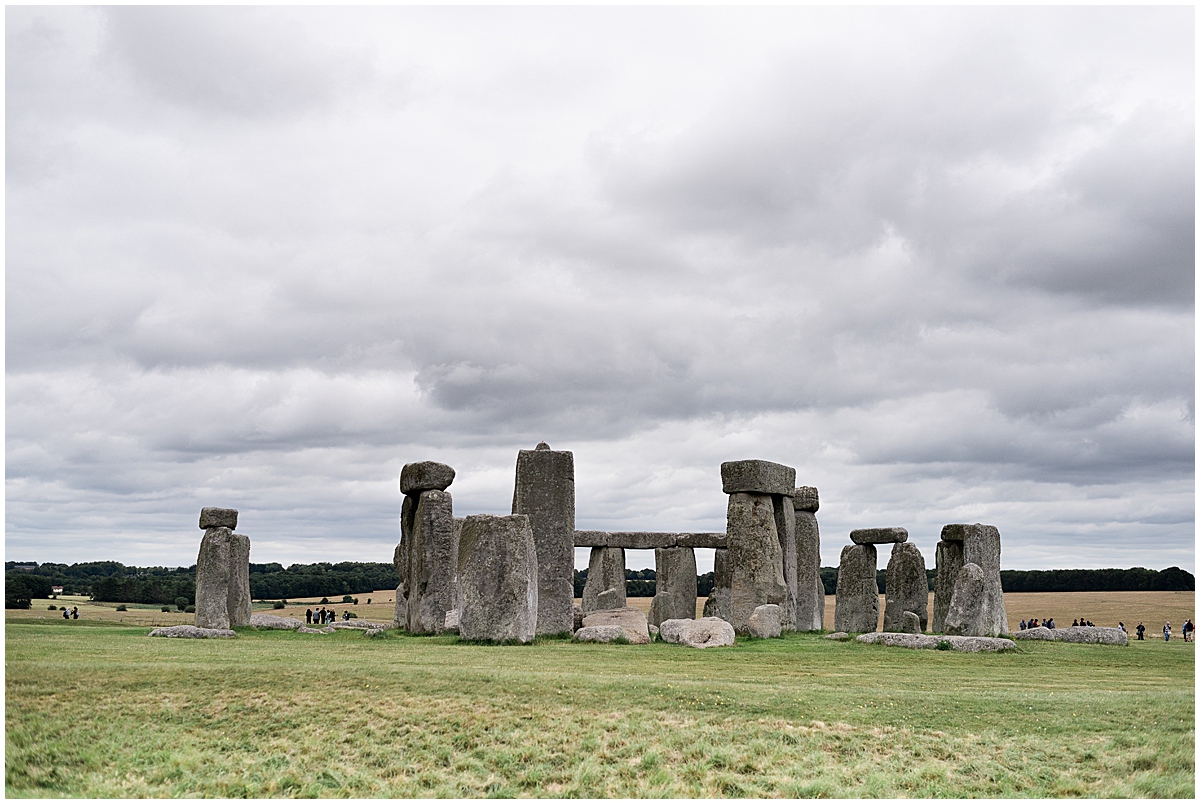 europe travel photographer stonehenge under a cloudy sky 