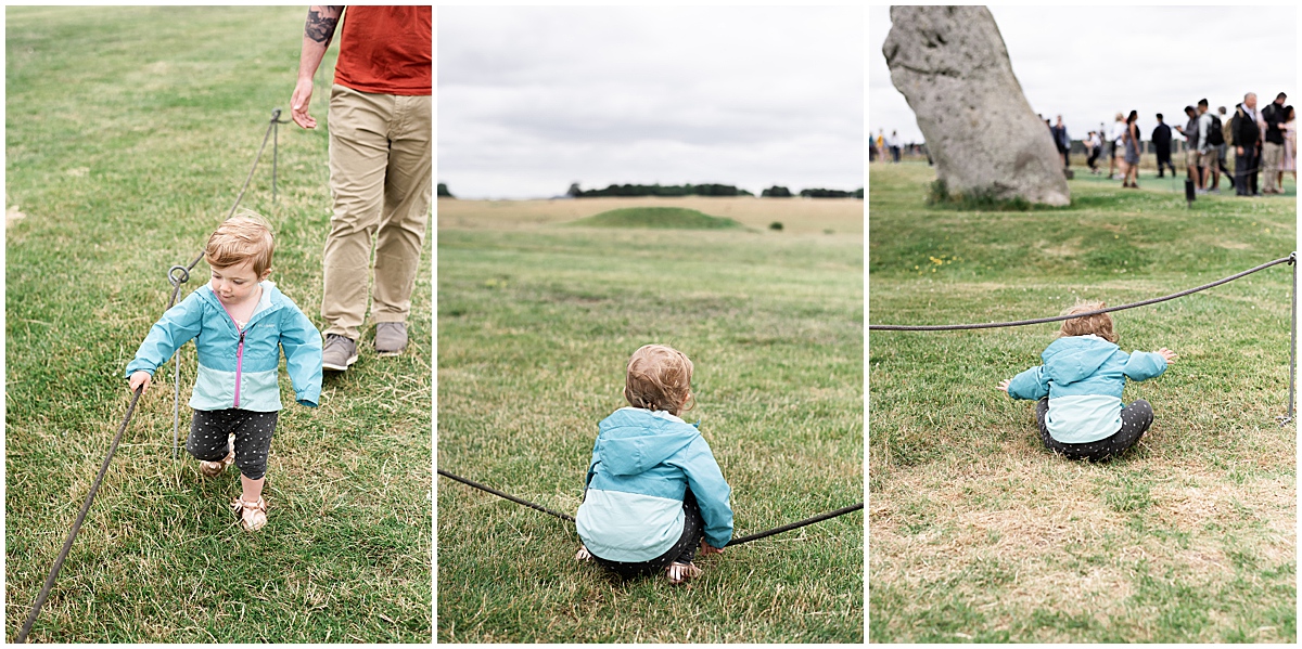 europe travel photographer toddler tries to run to stonehenge 