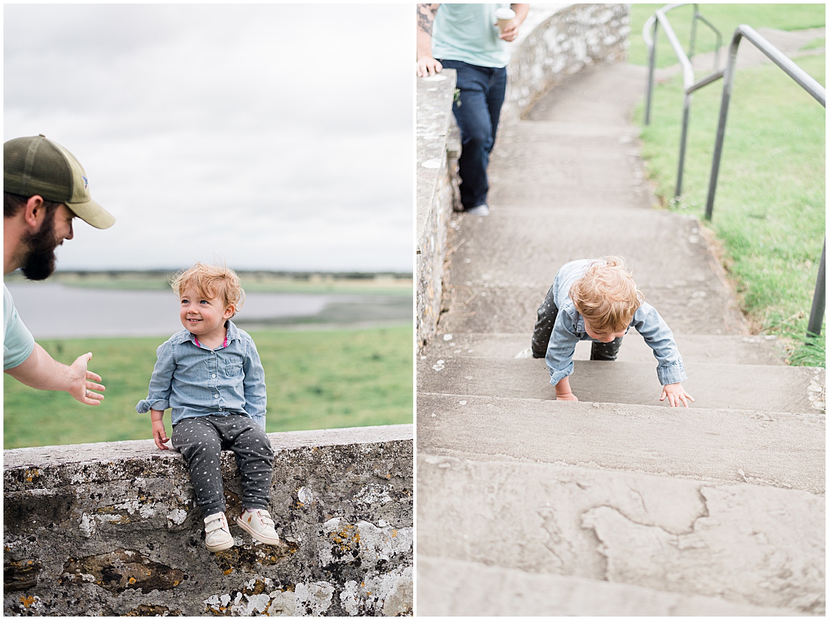 lifestyle photographer toddler runs around the grounds at clonmacnoise