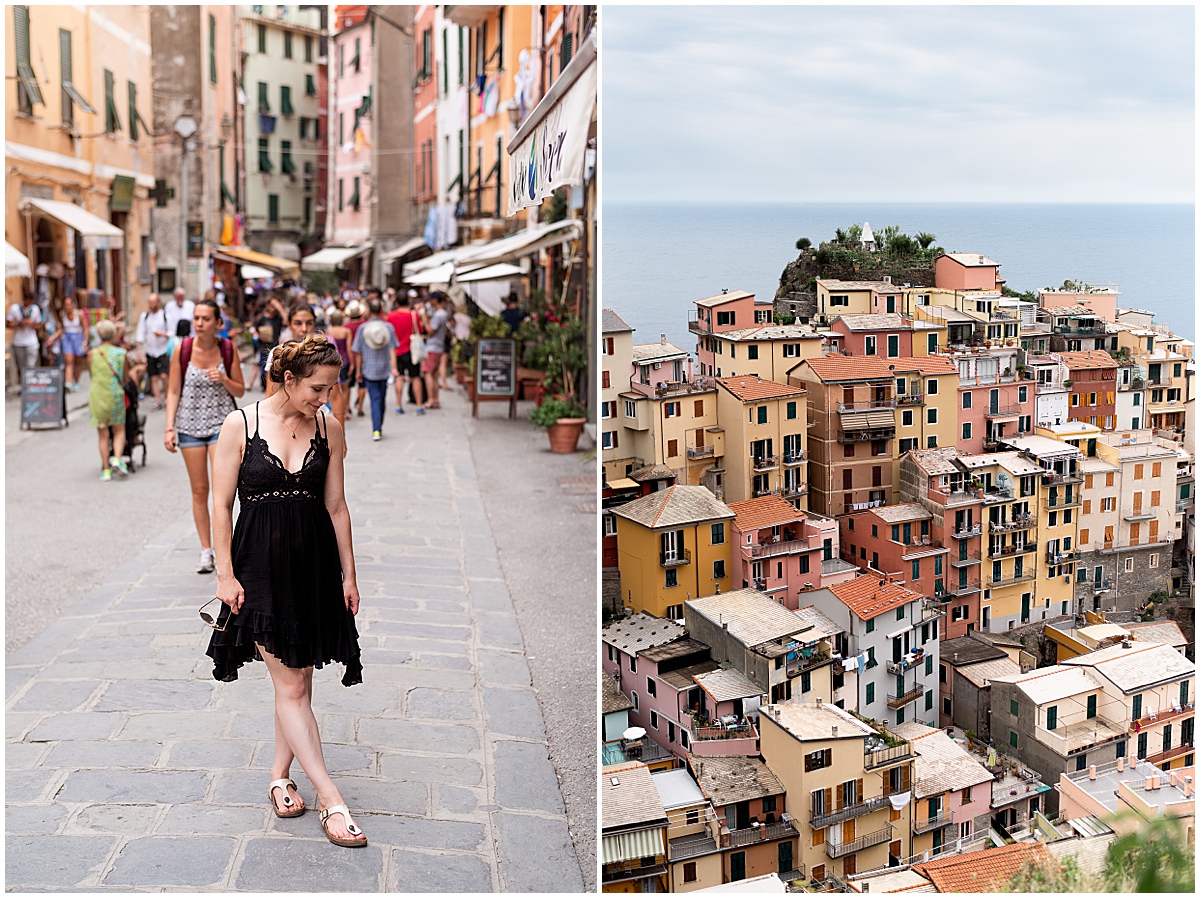 family vacation photographer woman in black dress walks down the colored streets of cinque terre
