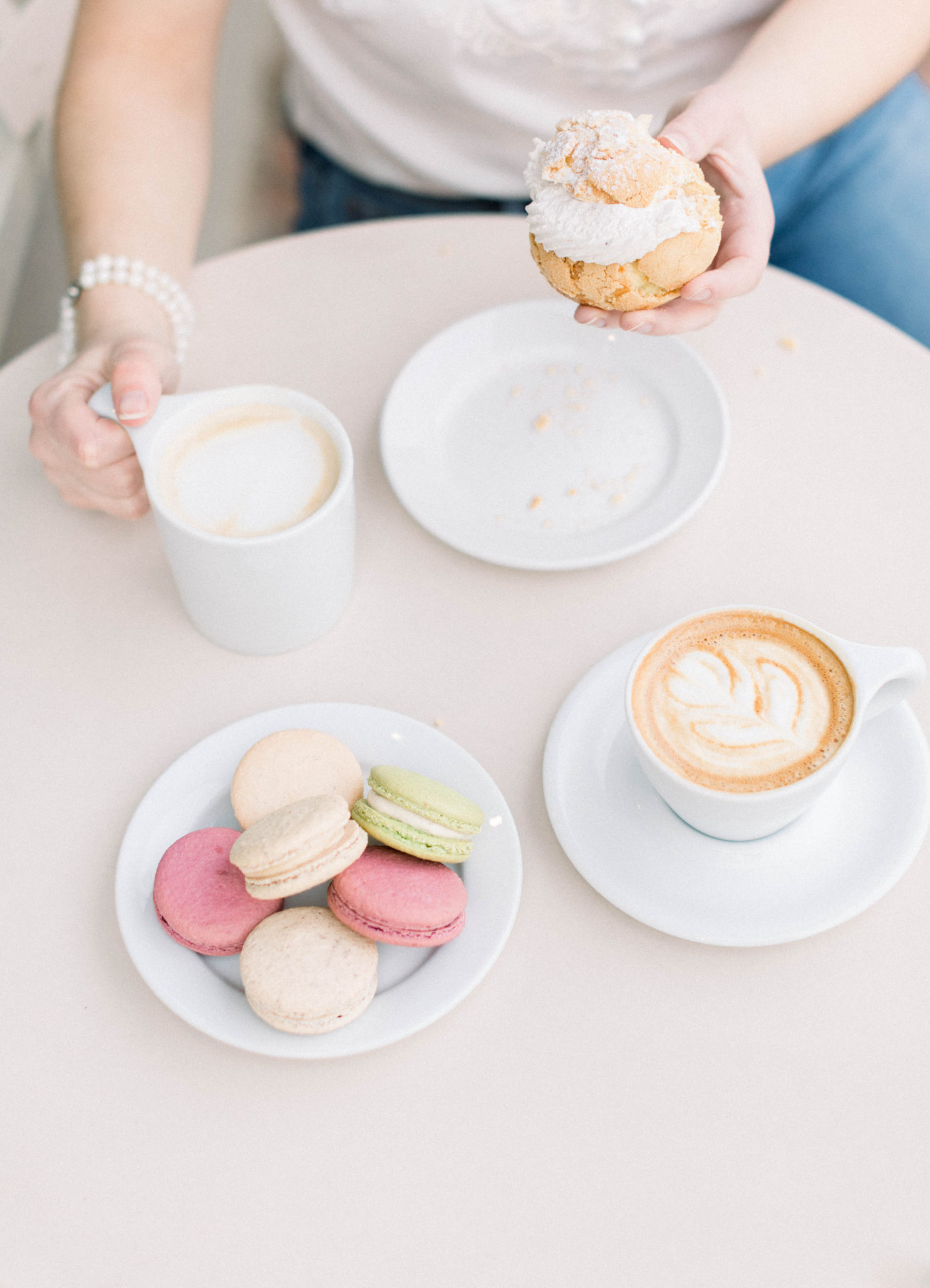 photographer hold coffee and pastries from pistacia vera