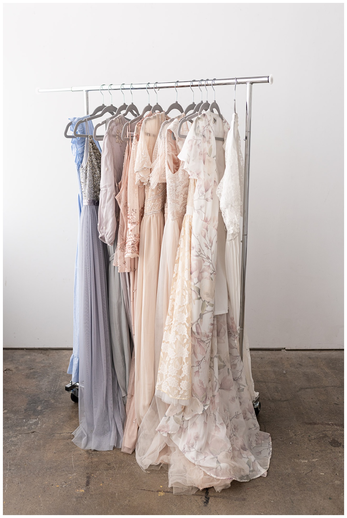 examples of the luxury photographer experience including luxury gowns in a studio wardrobe
