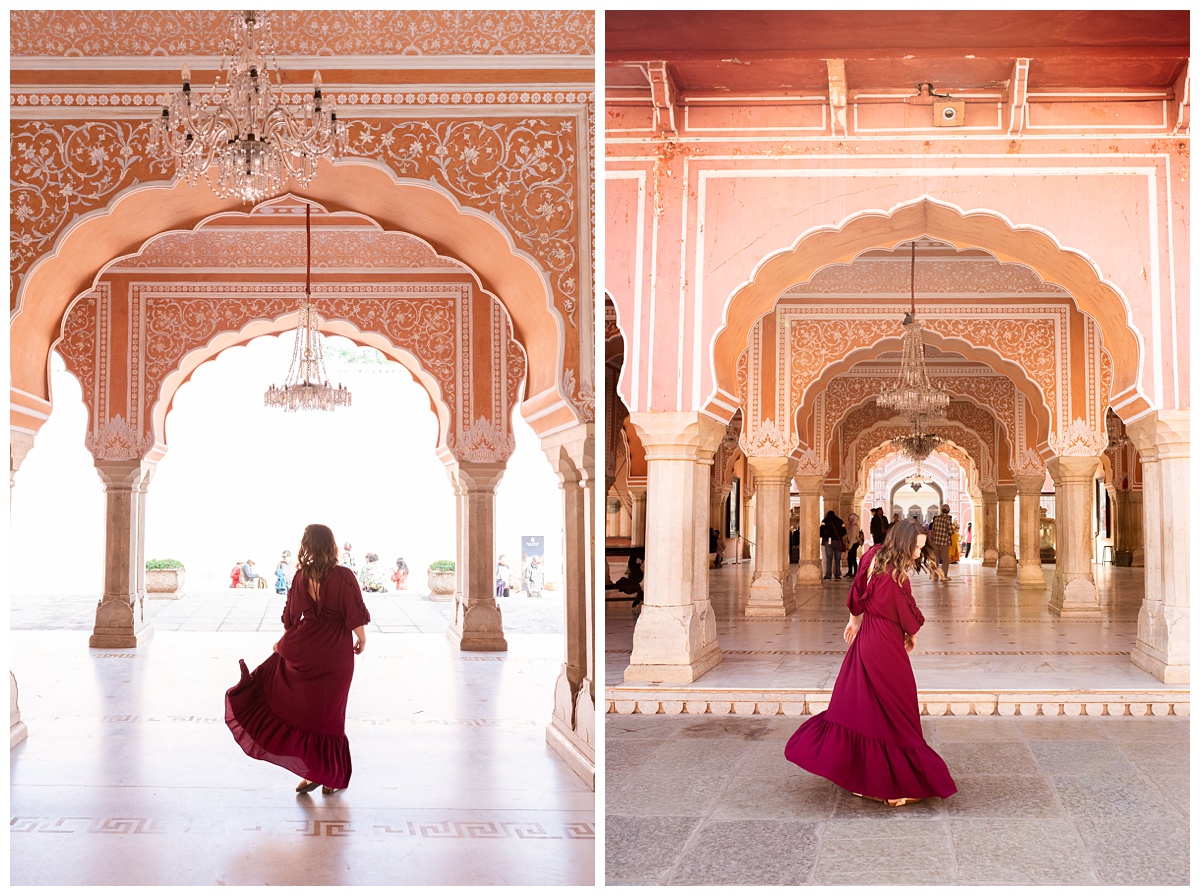 ohio lifestyle photographer twirls in pink archway in city palace jaipur