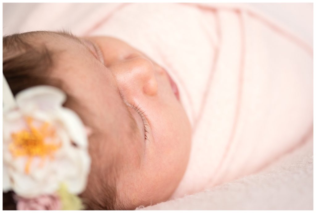 details of newborns nose and eyelashes