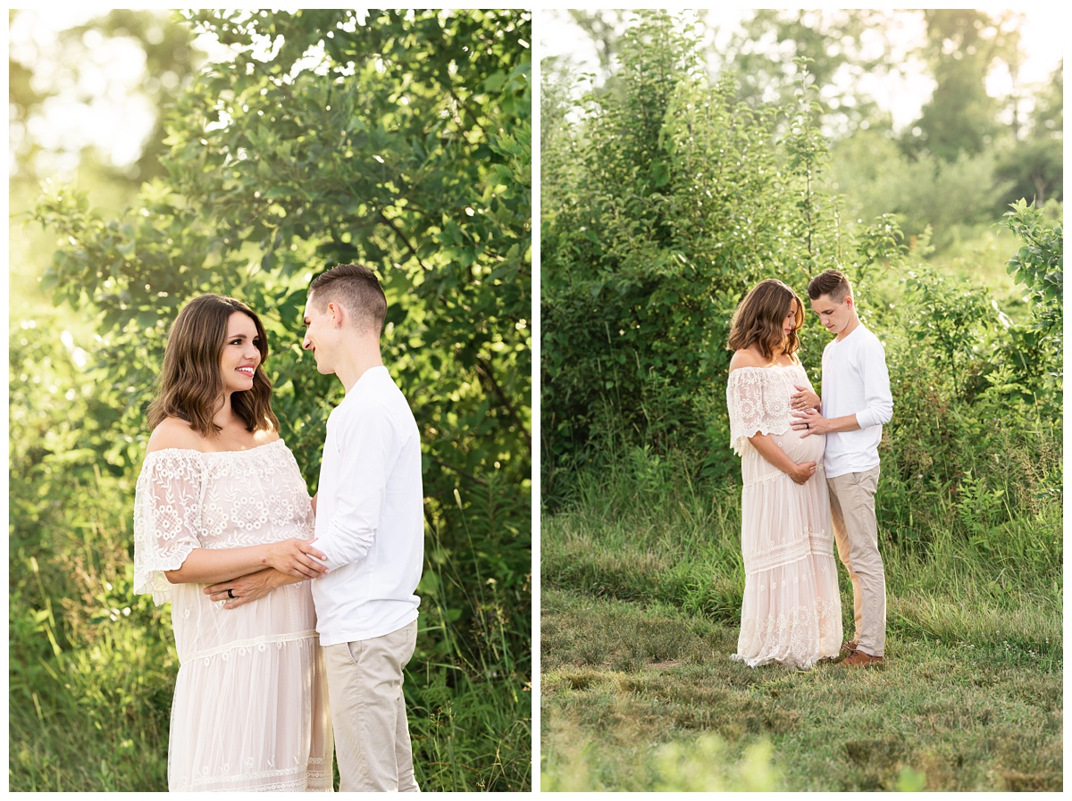 mom and dad look lovingly at each other for maternity photos