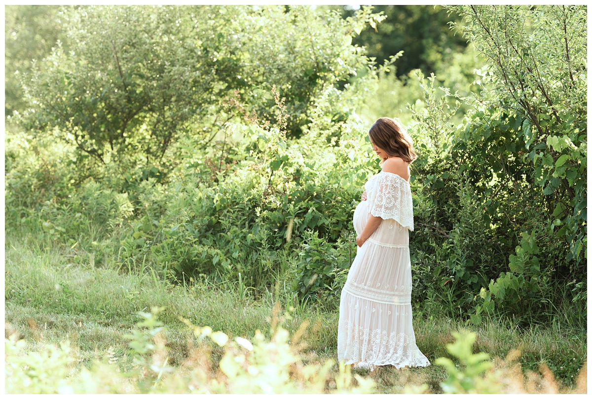 sunset haze and profile of mom in maternity session