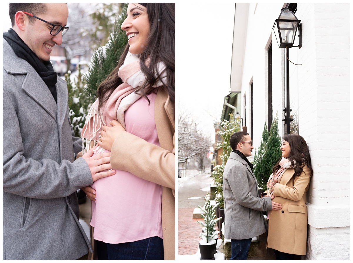 lifestyle maternity expecting couple cuddles and laughs in german village street