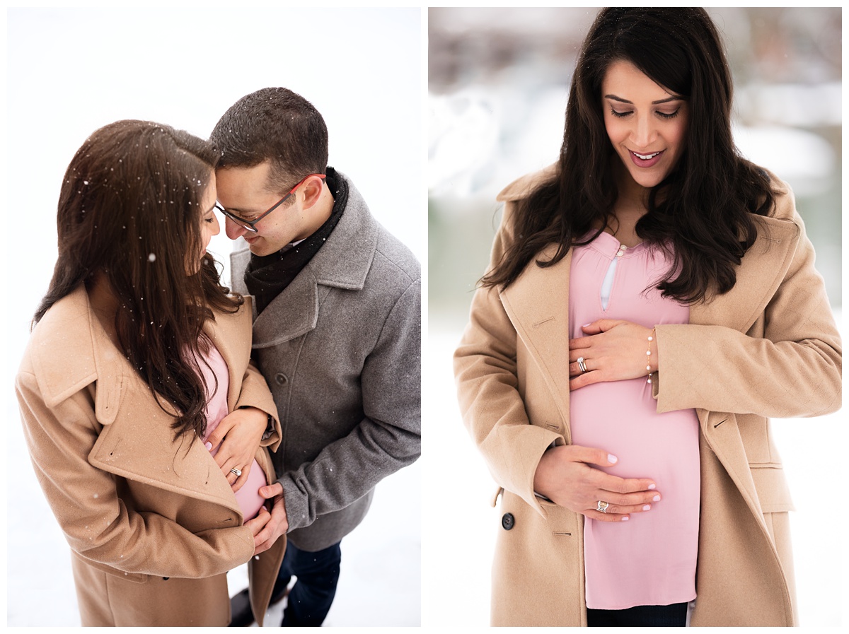 lifestyle maternity expecting mom and dad snuggle in the snow
