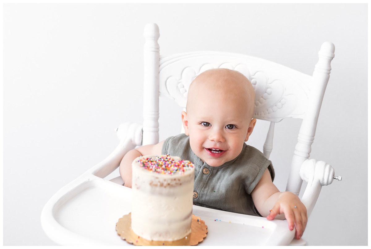 Top Newborn Photographer Columbus Ohio baby boy cake smash in studio white