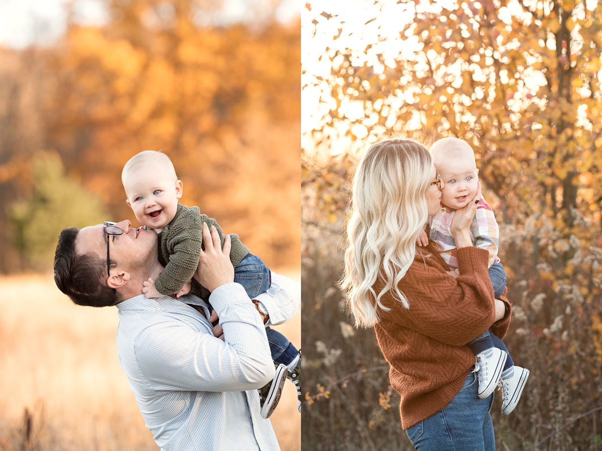 award winning Photographer Columbus Ohio mom and dad kiss baby boy in field