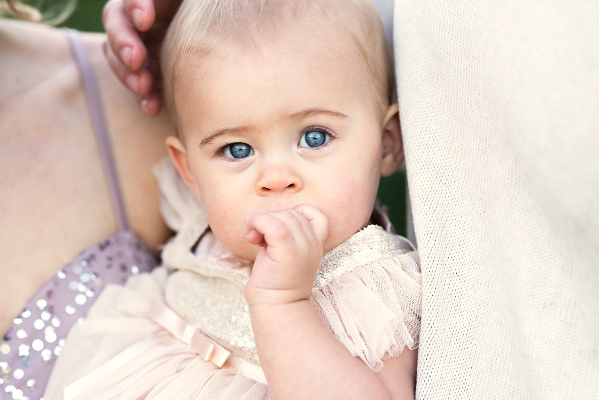 columbus baby photographer baby sucks thumb in blush dress