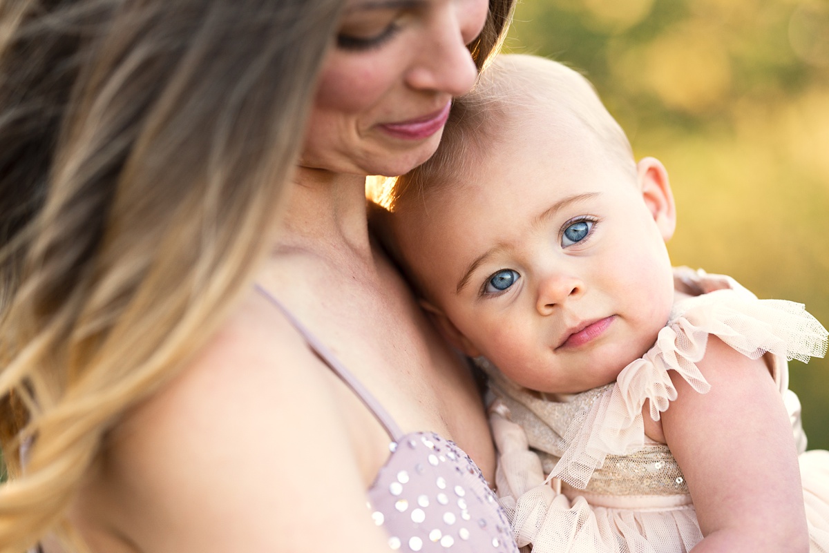columbus family photographer details of mom holding toddler girl 