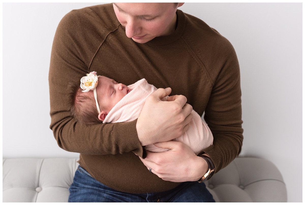 Lifestyle Newborn Photographer Columbus Ohio brynn burke photography newborn sleeps in dads arms