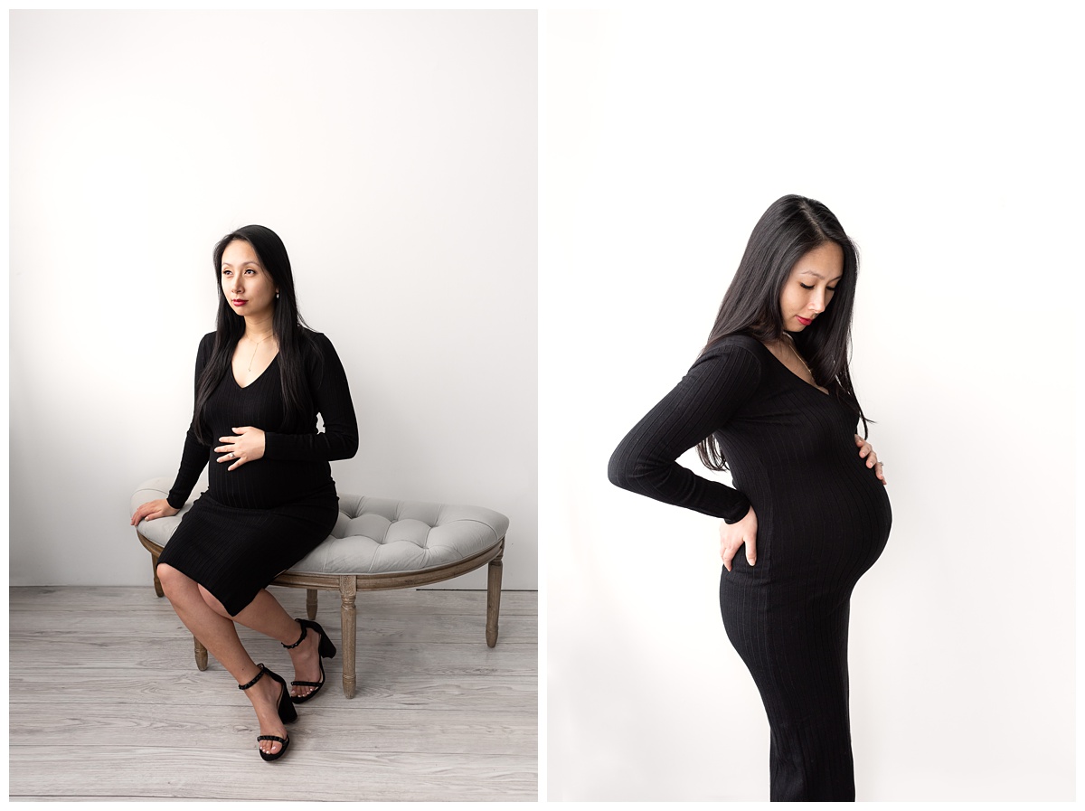 classic studio maternity columbus oh woman sits on grey bench in studio holding pregnant belly 