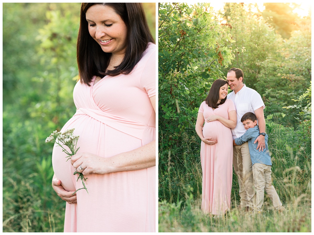 best maternity photographer mom cradles belly in pink dress holding wildflowers