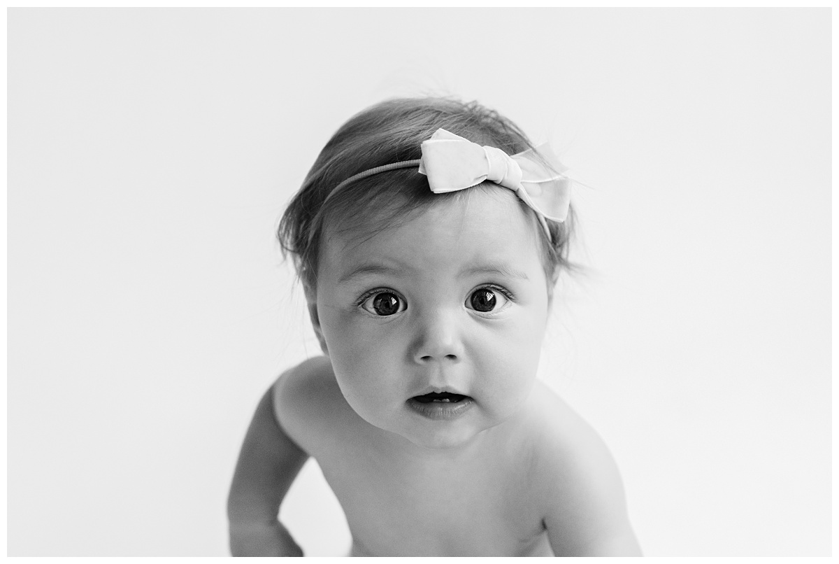 black and white portrait of baby girl with big eyes Classic Baby Portrait Photographer Columbus Ohio