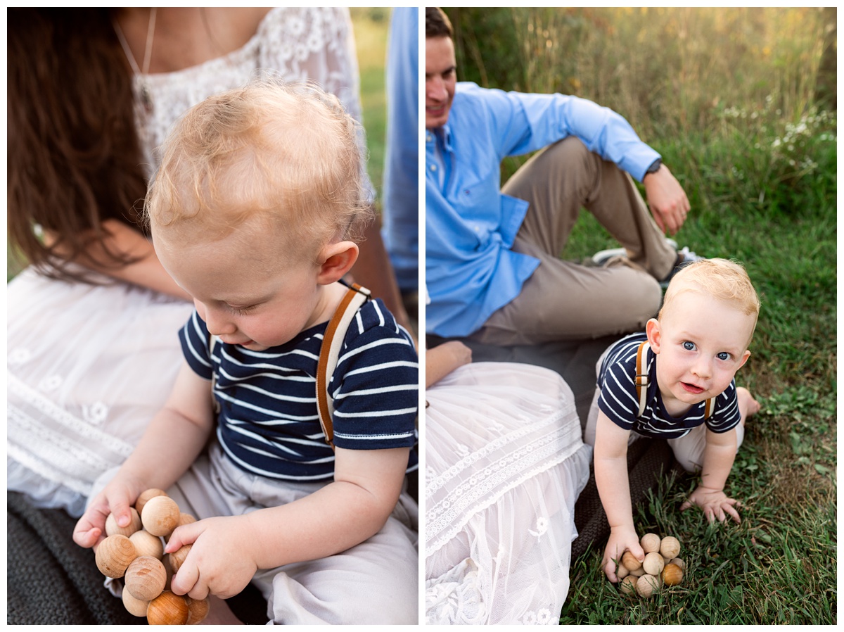 Summer Field Cake Smash baby boy plays with wooden toy in field